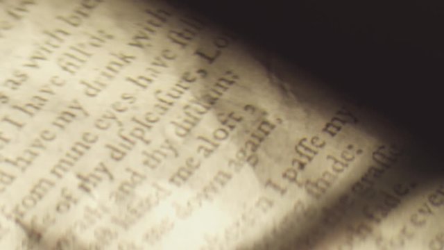 Text From Scripture Floating In and Out of Focus. Bible and scripture