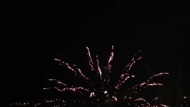 Large Red Firework Rocket Shooting up and Exploding TILT UP