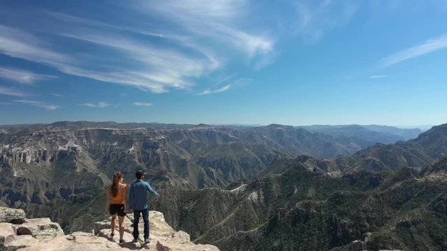 Aerial Drone View Of Two People Walking At Copper Canyon In Barrancas Del Cobre, Chihuahua, Mexico