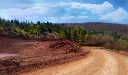 red ground landscape bauxite mineral aluminium ore near mine in Milici Bosnia and Herzegovina 