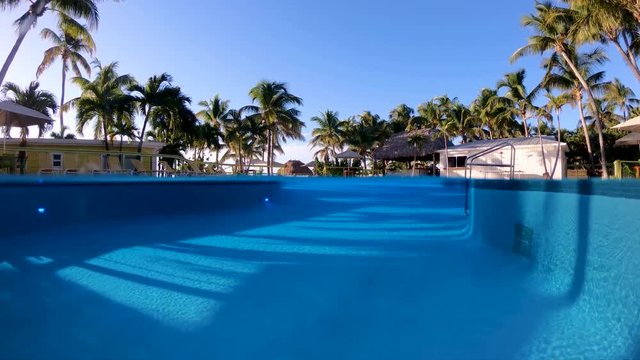 A 50/50 shot of a swimming pool in a Islamorada resort swimming pool. Florida Keys, FL>