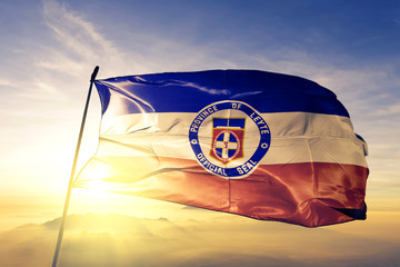 Leyte province of Philippines flag waving on the top sunrise mist fog