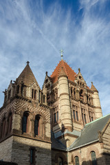 Fototapeta premium Top of elaborate church building in urban setting