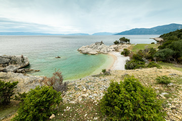 Small bay of Sveti Blaz on a cloudy day in spring