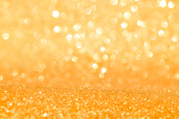 sparkle of golden glitter abstract background	