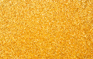 sparkle of golden glitter abstract background	