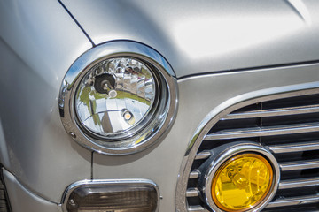 Obraz premium 自動車のヘッドライト Headlight of the car