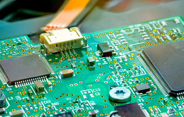 Electronic circuit board. Mainboard of computer. Computer integrated circuit board. Detail of...