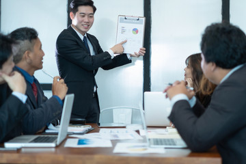 business people meeting brainstorming and discussing project together in office, teamwork concept