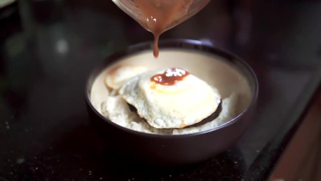 Making homemade loco moco a popular favorite in hawaii. Part 2 of 2, slow motion.