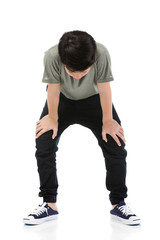 Naklejka premium Young Asian boy over white background, be upset; have a bad temper emotional.