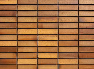 Wall tiles pattern Brown square brick texture Architecture details Abstract background