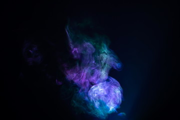 Obraz premium smoke abstract background multicolor . free form swirl flowing fog in the air .