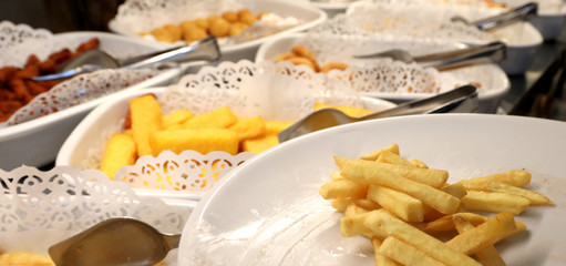 self service restaurant with many raw and cooked foods