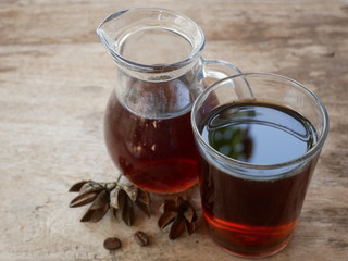 black coffee on wood table, sweet tea summer drink