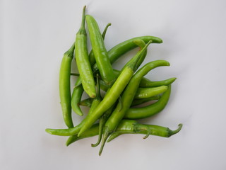 organic green chili pepper on white background