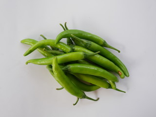organic green chili pepper on white background