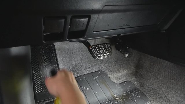 car wash, accelerator pedal cleaning in a modern car
