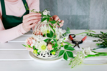 How to make floral arrangement with roses, dahlias and iris flowers inside a vintage bird cage