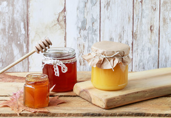 Honey in glass jar.