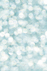 Blue glittering lights. Blurred abstract background.