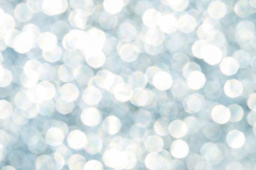 Blue glittering lights. Blurred abstract background.
