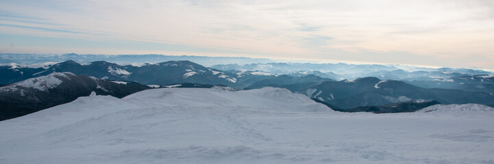 Amazing landscape in the winter mountains at sunrise