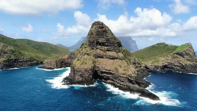 Stunning aerial 4k drone footage of Mount Eliza and North Beach on Lord Howe Island, a pacific subtropical island in the Tasman Sea between Australia and New Zealand. Mount Gower in the background.