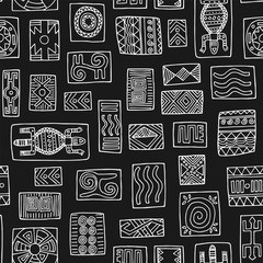 African tribal seamless pattern. Ethnic drawings on a black background.
