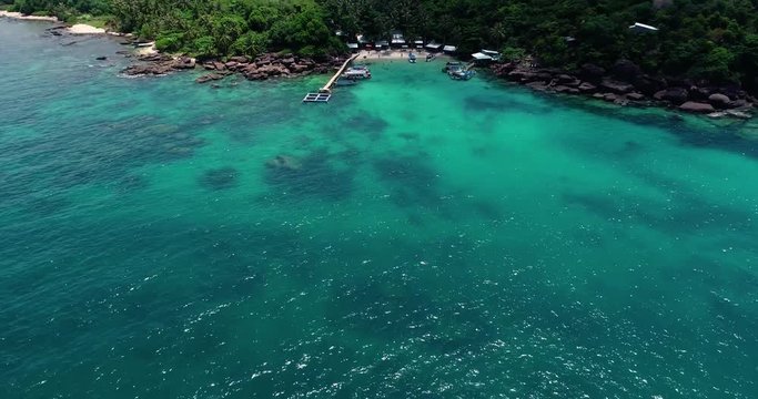 Phu Quoc Island by fly cam QUA G&Oacute;C NH&Igrave;N .Aerial view for beautiful beach with palms and crystal clear water 