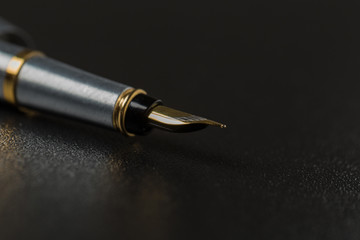 Fountain pen with clipping path on black background