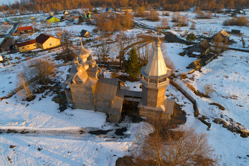 The ancient Church of Dmitry of Thessalonica Myrrh-streaming on April evening (shot from a quadcopter). Village Shcheleyki, Leningrad Region, Russia
