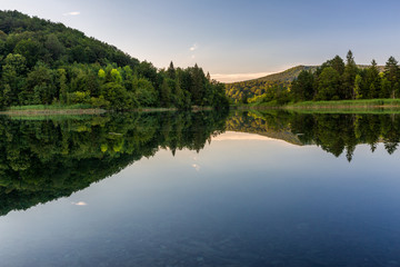 Fototapeta na wymiar Calm evening on the beautiful lake in Plitvice Lakes National Park, Croatia