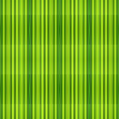 abstract seamless background with yellow green, very dark green and green yellow vertical stripes. can be used for wallpaper, poster, fasion garment or textile texture design