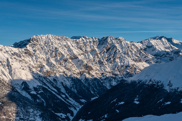 Beautiful mountains and rocks around Bormio, Sondrio, Italy. Alps, sunny winter day.