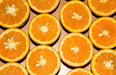 Fresh half cut oranges