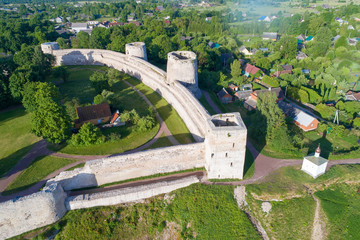 View of the towers of the Izborsk fortress on a sunny June day (shot from a quadrocopter). Pskov Region, Russia