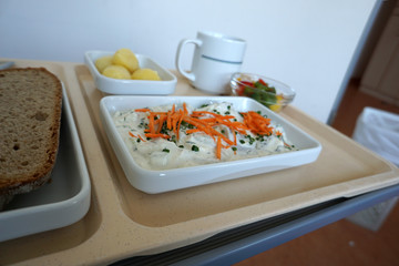 Dill snack with butter cheese and potatoes in a canteen in Germany