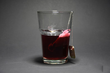 Glass of Tea on black background