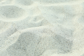 Sea ​​sand as background, space for text, closeup. Summer backdrop