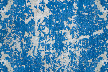 background of the old wooden wall with cracked, shabby, shabby blue paint.