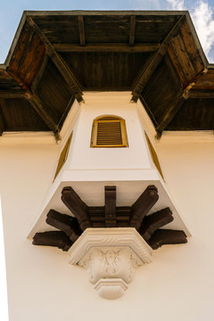 Close view of an beautiful crafted brattice of an old building.