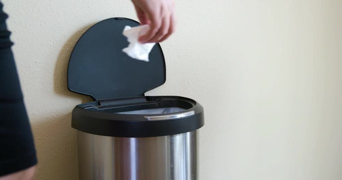 Man Throws Away Paper Towel in Motion Sensing Touchless Trash Can - Medium Side