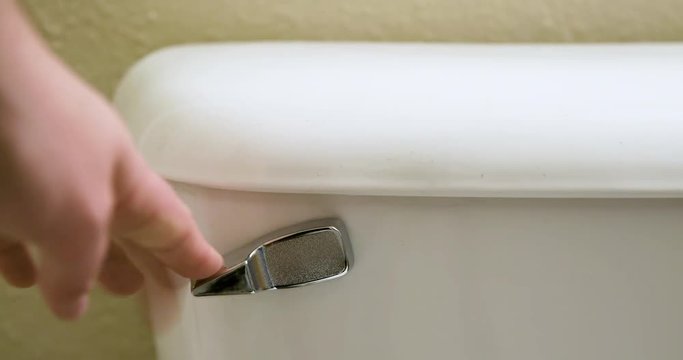 Man Closing Toilet Lid then Flushing - Close