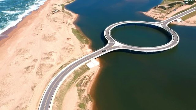 Aerial, drone footage from the round Garzon Bridge, Maldonado, Uruguay.