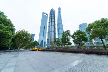 The pedestrian pavement under the tall building large building
