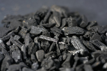 Dried herbs for seasoning spices in best studio quality photographed partly isolated against black background 