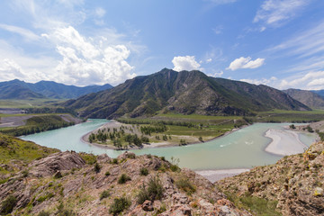 Panoramic view of an Altai mountain Katun river. Place of confluence of Katun and Chuya rivers....