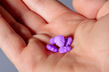 Amphetamine, Blue, pink, purple army Skull, Ecstasy, XTC pills isolated on a white background.