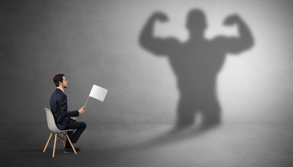 Businessman staying and offering stuffs to a shadow businessman
